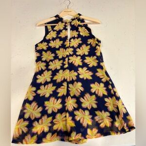 Like New. Floral Romper only worn less than a handful of times.